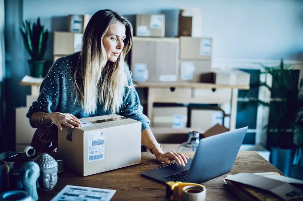 Online store owner managing customer calls